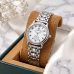 "Elegant Silver Women's Watch with White Dial"
