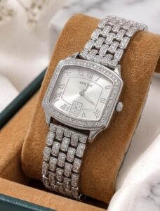 Luxury style silver 925 analog watch for women displayed in a watch box.