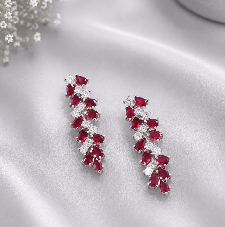 Silver 925 pink floral pendant with matching stud earrings featuring sparkling stones on a luxury silver background.