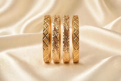 21K gold traditional bangles set with elegant engraved design, set of four bangles
