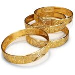 21K gold traditional bangles set with elegant engraved design, set of four bangles
