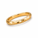 A luxury 21K gold band ring with a sparkling diamond-cut texture, perfect for daily wear