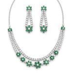 Emerald green flower double layer diamond tennis necklace set with matching earrings on white background - luxury artificial jewelry