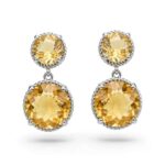 Golden drop earrings set in detailed silver