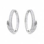 Pure silver snake nail design bali earrings on model ear – 925 silver hoop