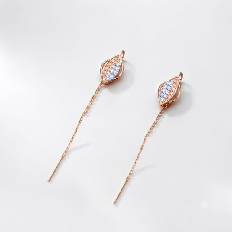 Pair of rose gold leaf shaped sui dhaga chain threader earrings with white zircon stones